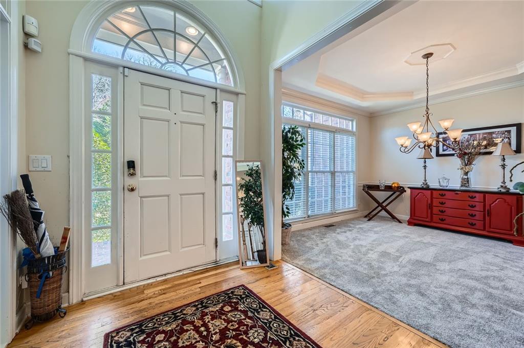 5106 Vining Estates Way Mableton, GA 30126 - Photo 3 of 28 a view of a livingroom with furniture and a chandelier