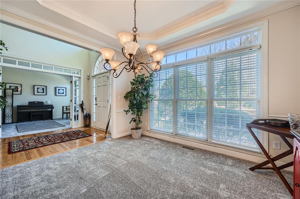 5106 Vining Estates Way Mableton, GA 30126 - Photo 6 of 28 a view of livingroom with furniture and chandelier
