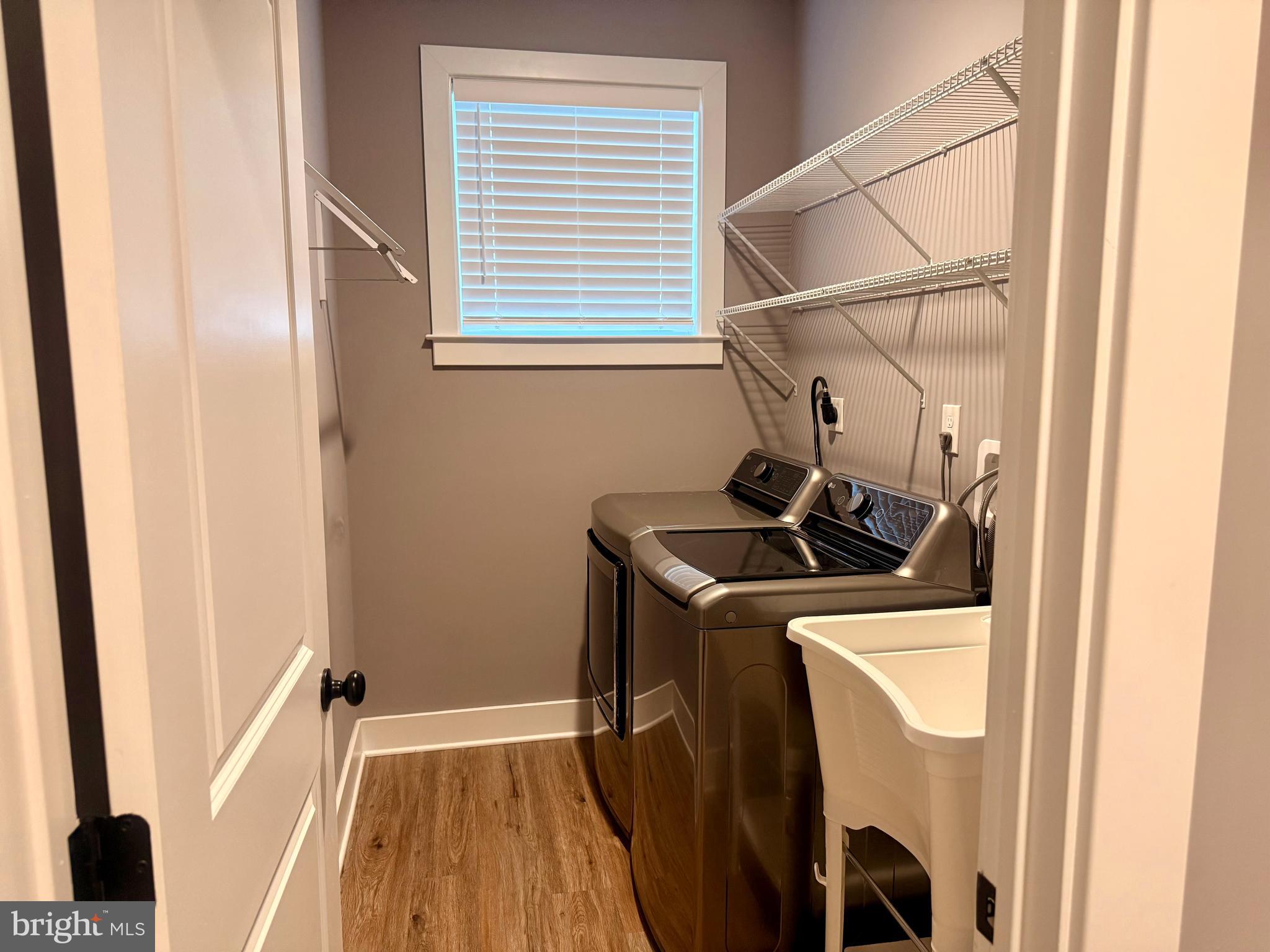 1921 Montevideo Road Jessup, MD 20794 - Photo 16 of 48 WASHER, DRYER, UTILITY SINK, & WIRE SHELVING