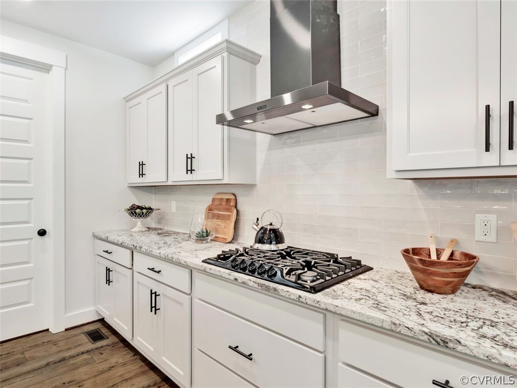 9112 Haynes Bridge Road Chesterfield, VA 23832 - Photo 5 of 18 a kitchen with stainless steel appliances granite countertop a sink stove and cabinets