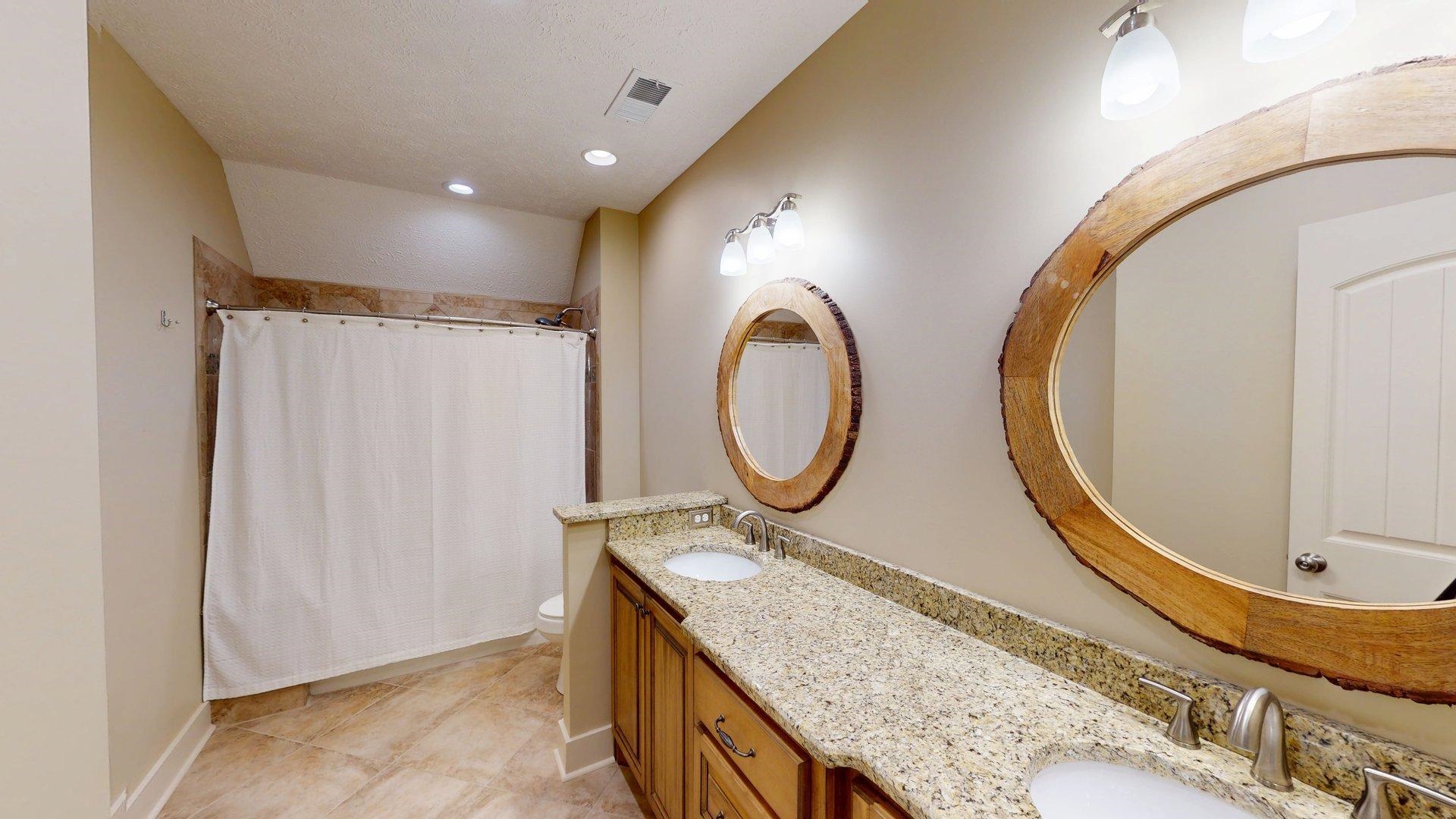 540 Breathtaking Loop Savannah, TN 38372 - Photo 17 of 40 a bathroom with a granite countertop sink and mirror