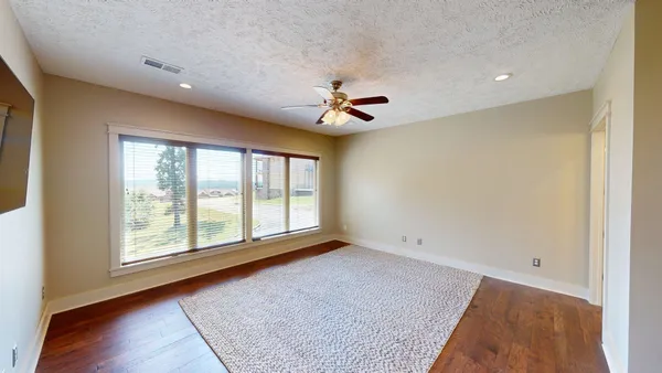 a view of a livingroom with a flat screen tv