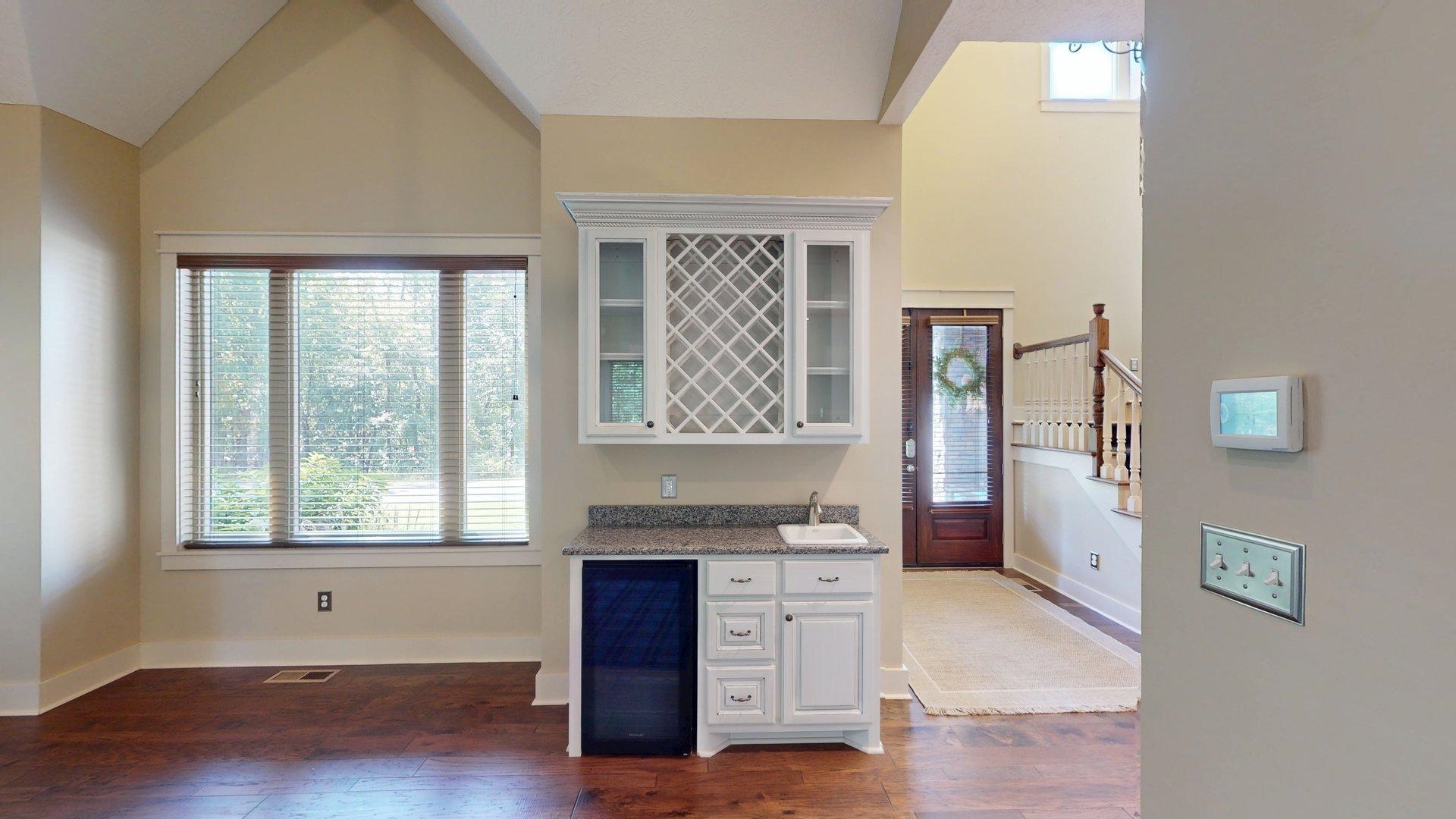 540 Breathtaking Loop Savannah, TN 38372 - Photo 9 of 40 a view of an empty room with a window and wooden floor