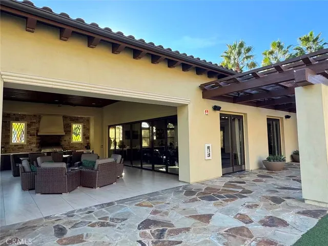 a lake view with a yard and potted plants