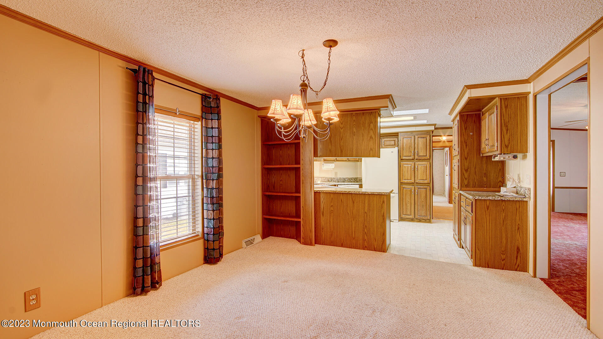 76 Village Road Morganville, NJ 07751 - Photo 3 of 27 a bedroom with a bed dresser and a window