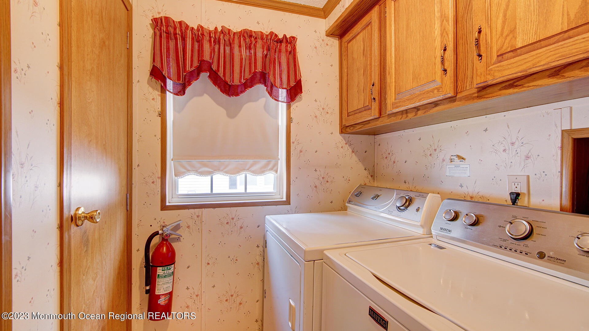 76 Village Road Morganville, NJ 07751 - Photo 5 of 27 a utility room with dryer and washer