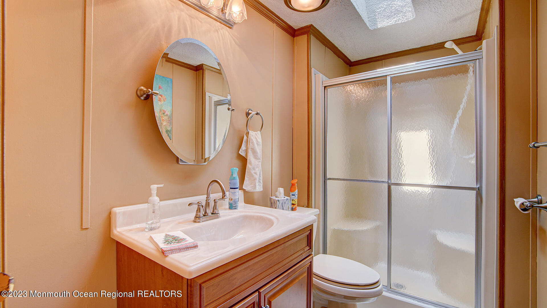 76 Village Road Morganville, NJ 07751 - Photo 6 of 27 a bathroom with a sink toilet and shower