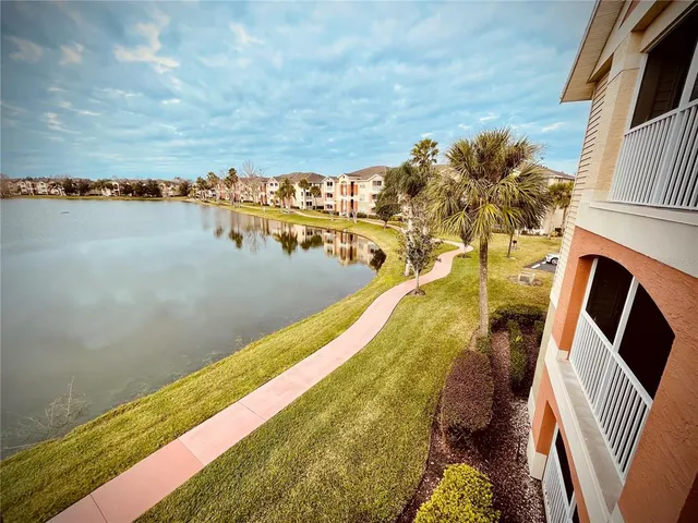 a view of swimming pool with an ocean view