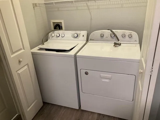 a utility room with dryer and washer