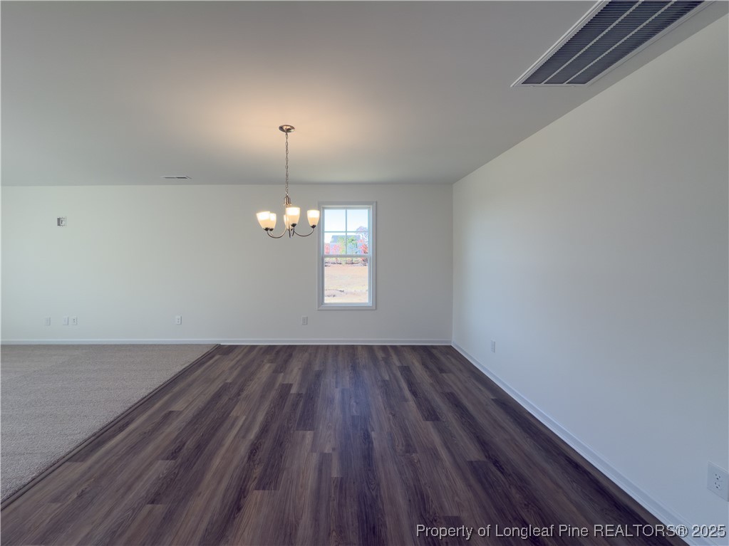 2107 Roadster Pony (lot 43) Lane Hope Mills, NC 28348 - Photo 6 of 17 wooden floor in an empty room with a window