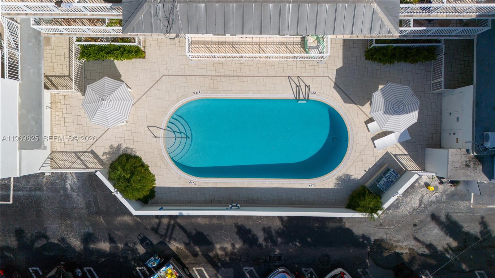 290 Sunrise Drive, Unit 2L Key Biscayne, FL 33149 - Photo 12 of 16 a bird view of a fireplace with wooden walls