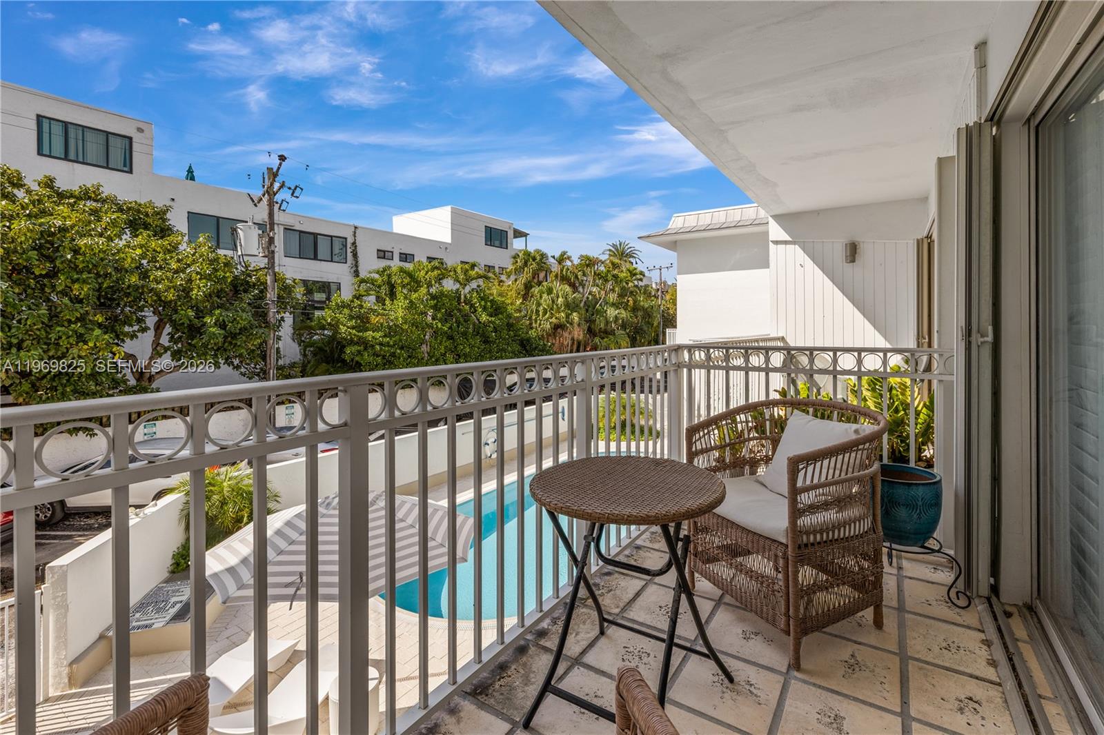 290 Sunrise Drive, Unit 2L Key Biscayne, FL 33149 - Photo 6 of 16 a view of a balcony with furniture