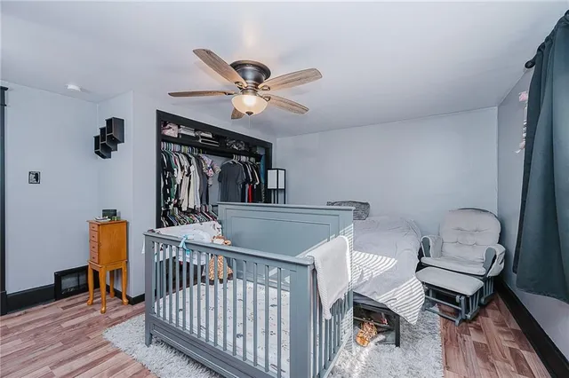 a view of a dining room with furniture and a chandelier