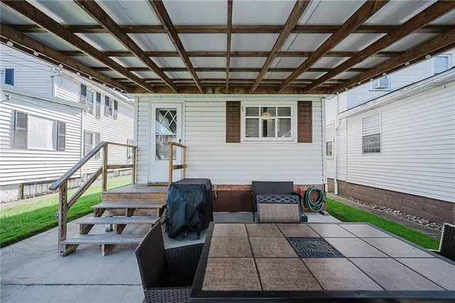 a view of a porch with furniture
