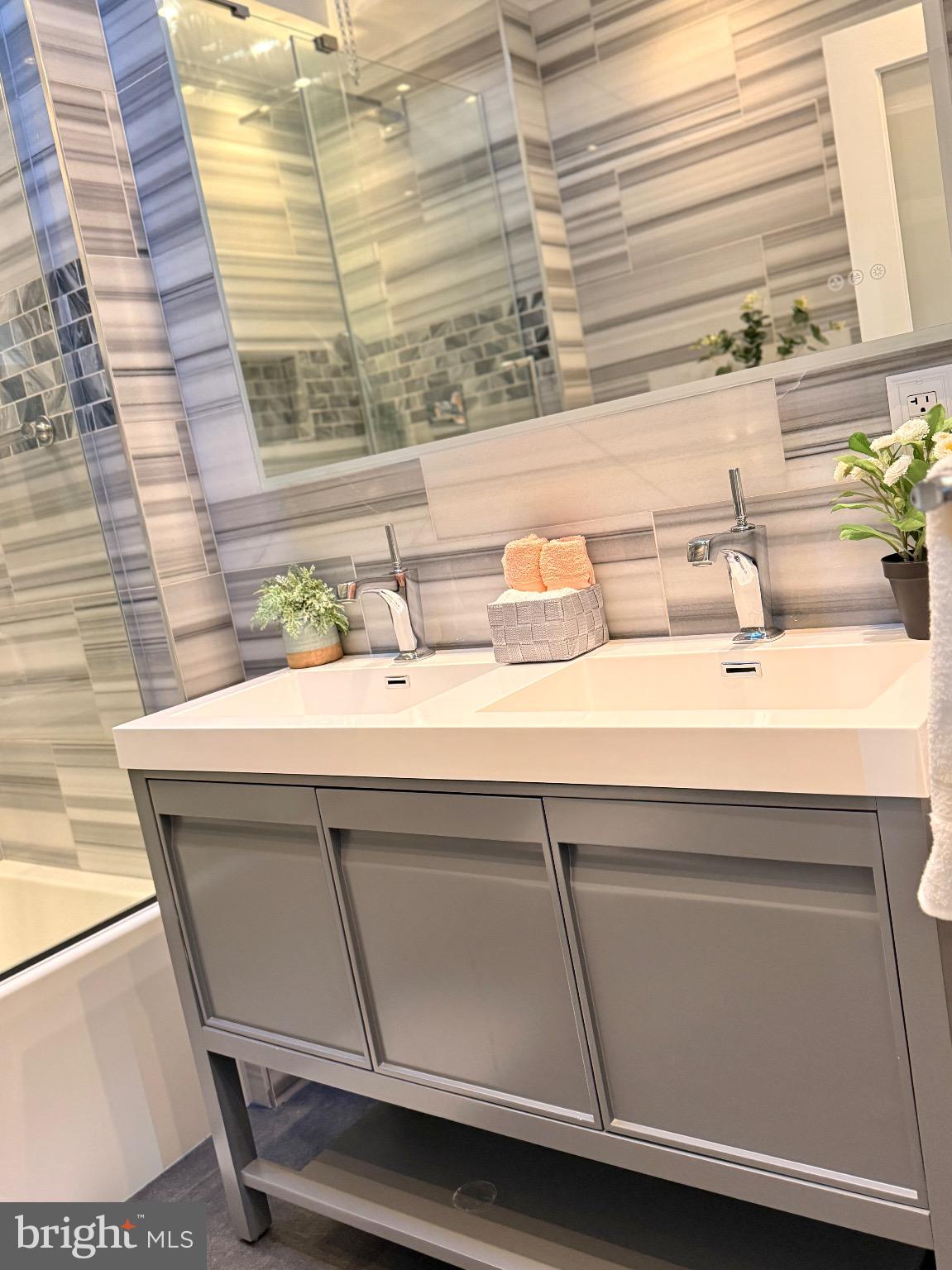 1407 South 28th Street Philadelphia, PA 19146 - Photo 15 of 25 a bathroom with a sink and a window