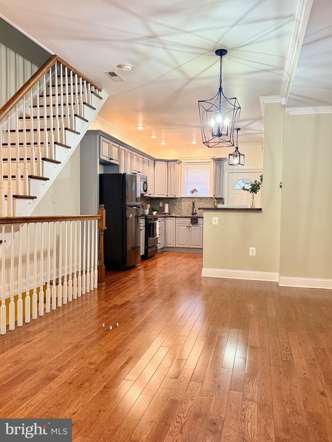 1407 South 28th Street Philadelphia, PA 19146 - Photo 5 of 25 a view of a kitchen and kitchen counter tops with wooden floor