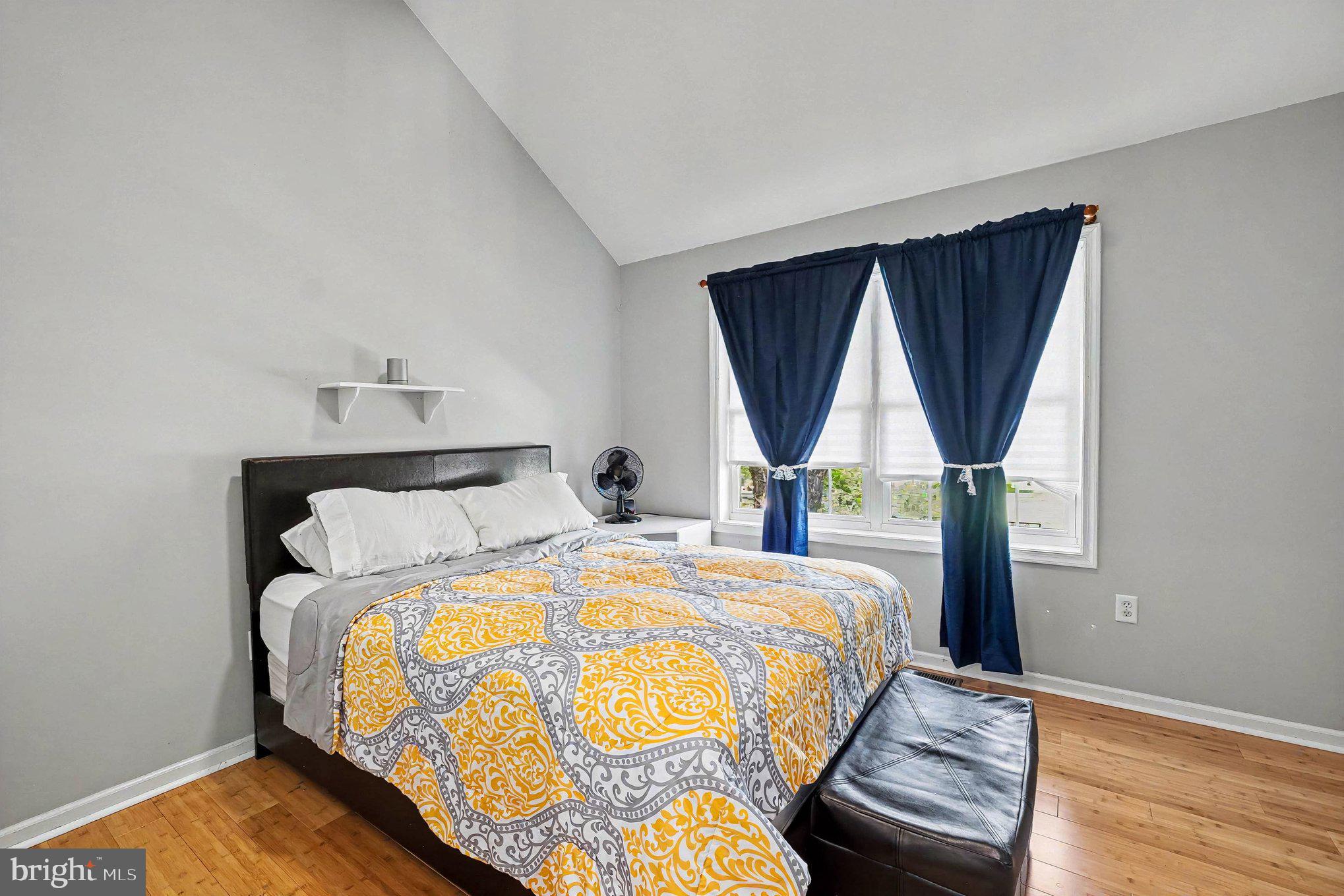 64 Open Meadow Court Elkton, MD 21921 - Photo 36 of 57 a bedroom with a bed a mirror and a window
