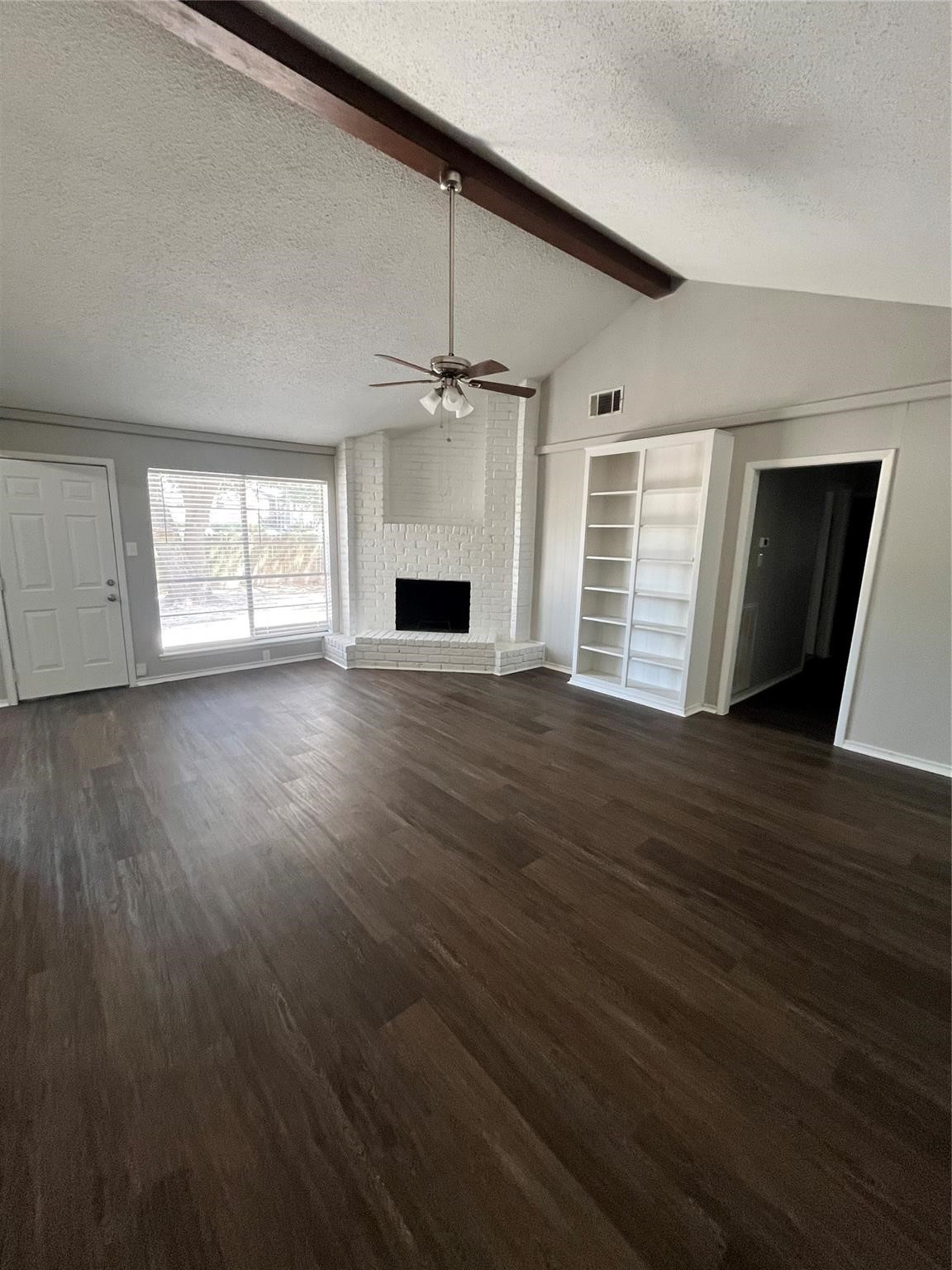 22318 Meadowgate Drive Spring, TX 77373 - Photo 8 of 8 an empty room with wooden floor and windows