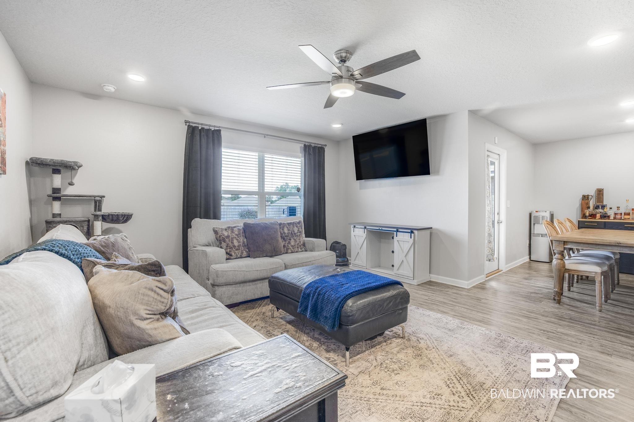 10738 Ridgeview Drive Mobile, AL 36608 - Photo 14 of 48 Living room featuring light wood-type flooring, ceiling fan, a textured ceiling, and recessed lighting