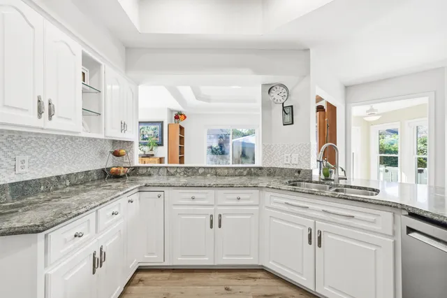 front view of a house with a garden