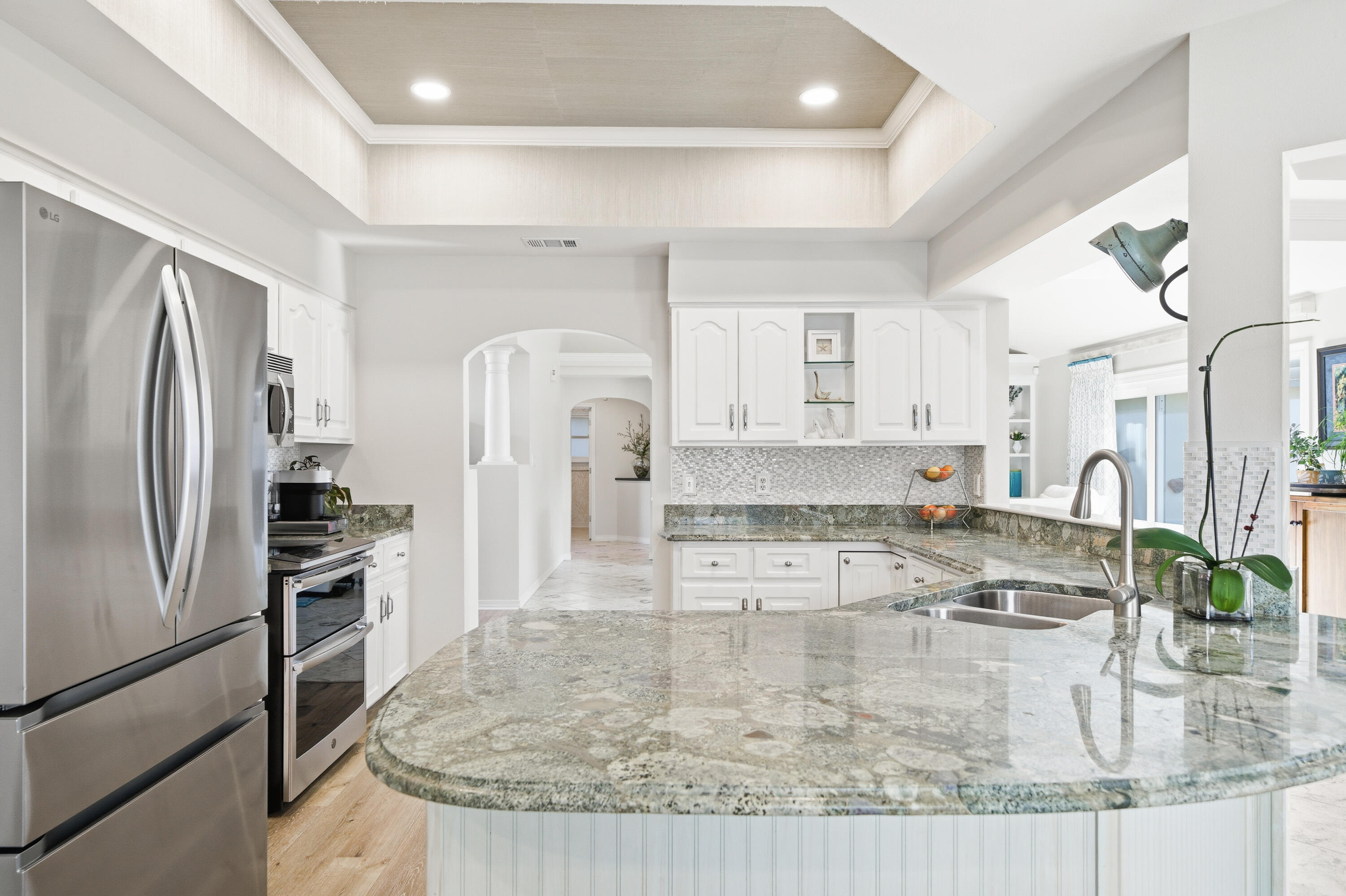 25 Tristram Way Miramar Beach, FL 32550 - Photo 29 of 50 a kitchen with stainless steel appliances granite countertop a refrigerator and a sink