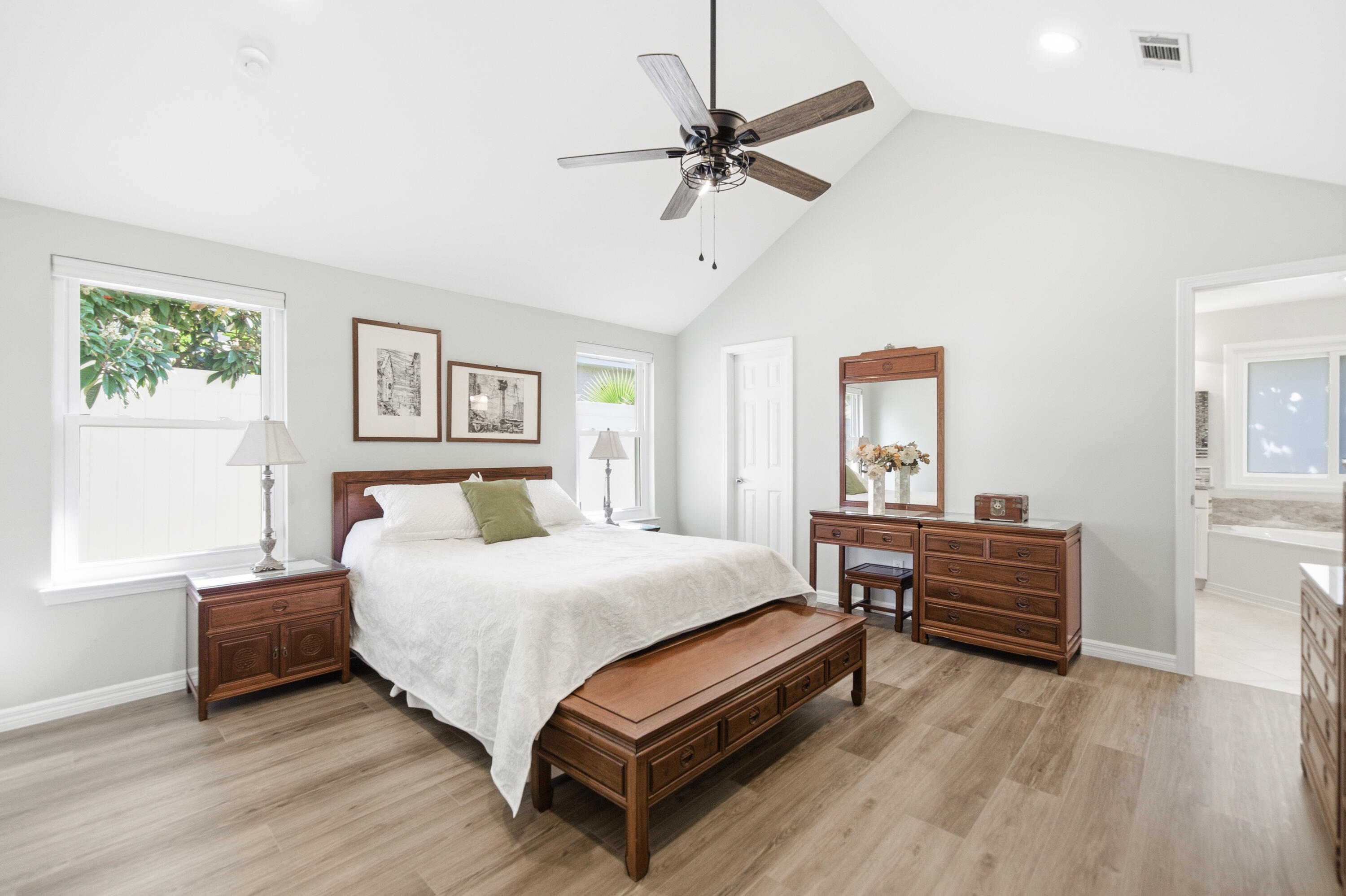 25 Tristram Way Miramar Beach, FL 32550 - Photo 35 of 50 a bedroom with a bed and a chandelier