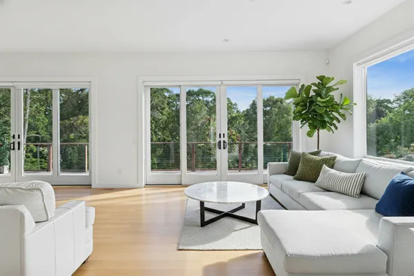 a view of a dining room with furniture window and outside view
