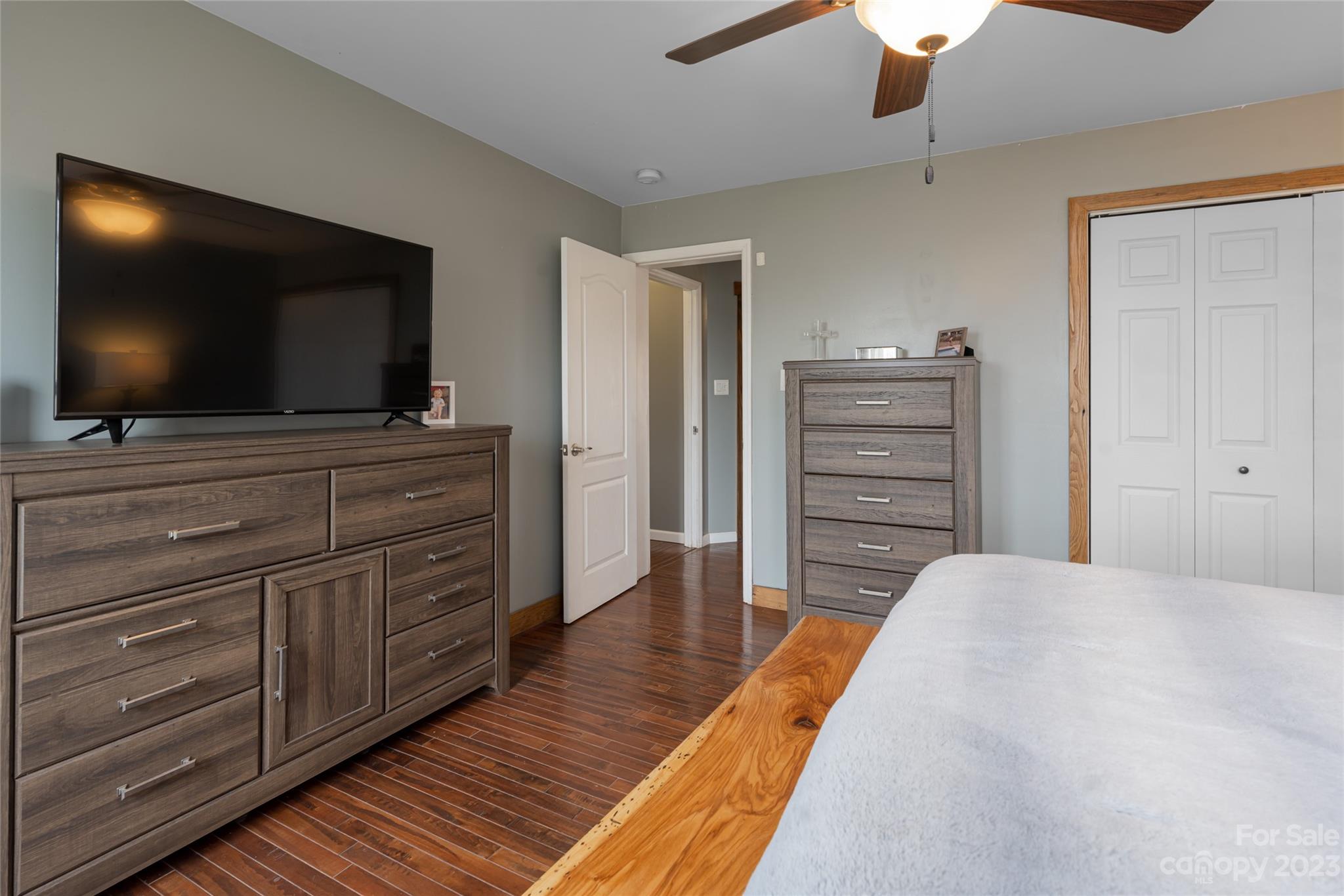 142 Blake Drive Canton, NC 28716 - Photo 12 of 44 a living room with furniture and a flat screen tv