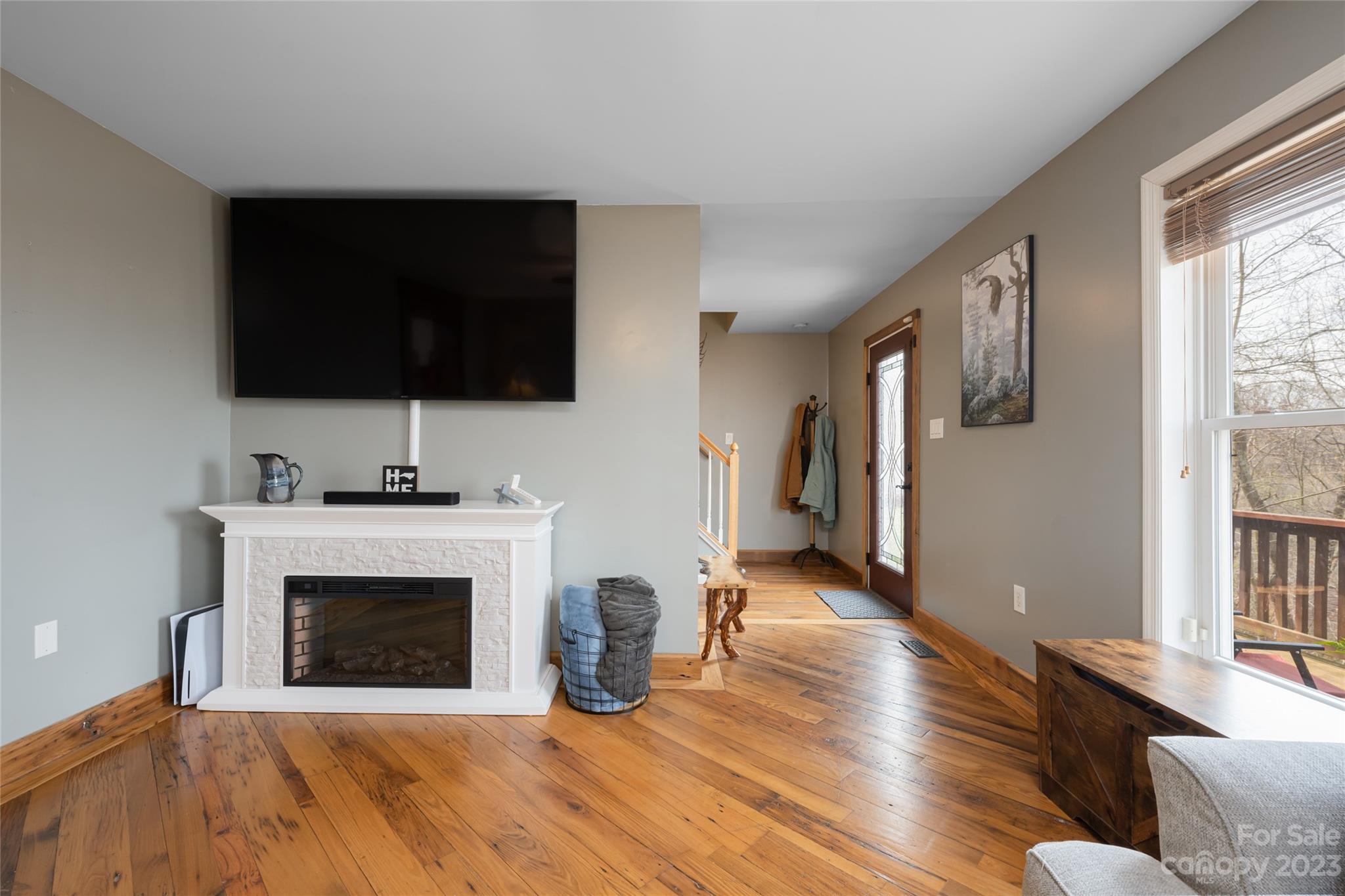 142 Blake Drive Canton, NC 28716 - Photo 30 of 44 a living room with furniture and a fireplace