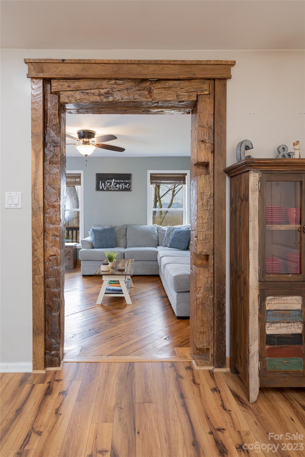 142 Blake Drive Canton, NC 28716 - Photo 5 of 44 a living room with furniture and a chandelier