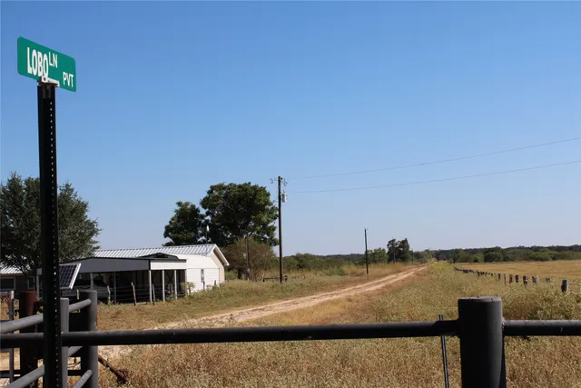 a view of a lake with a big yard
