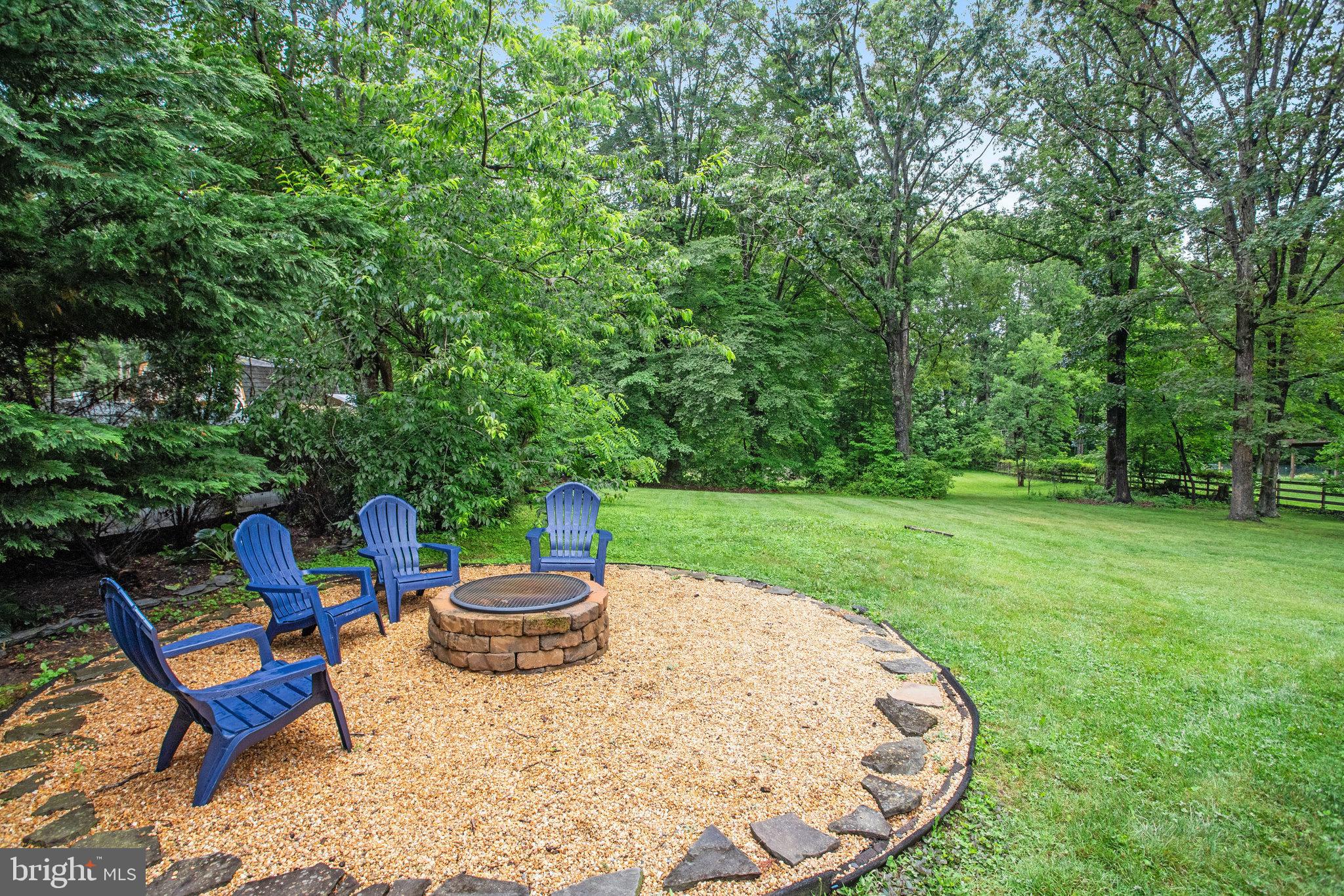 10704 Montgomery Drive Manassas, VA 20111 - Photo 46 of 53 Enjoy the long summer evenings by the fire!
