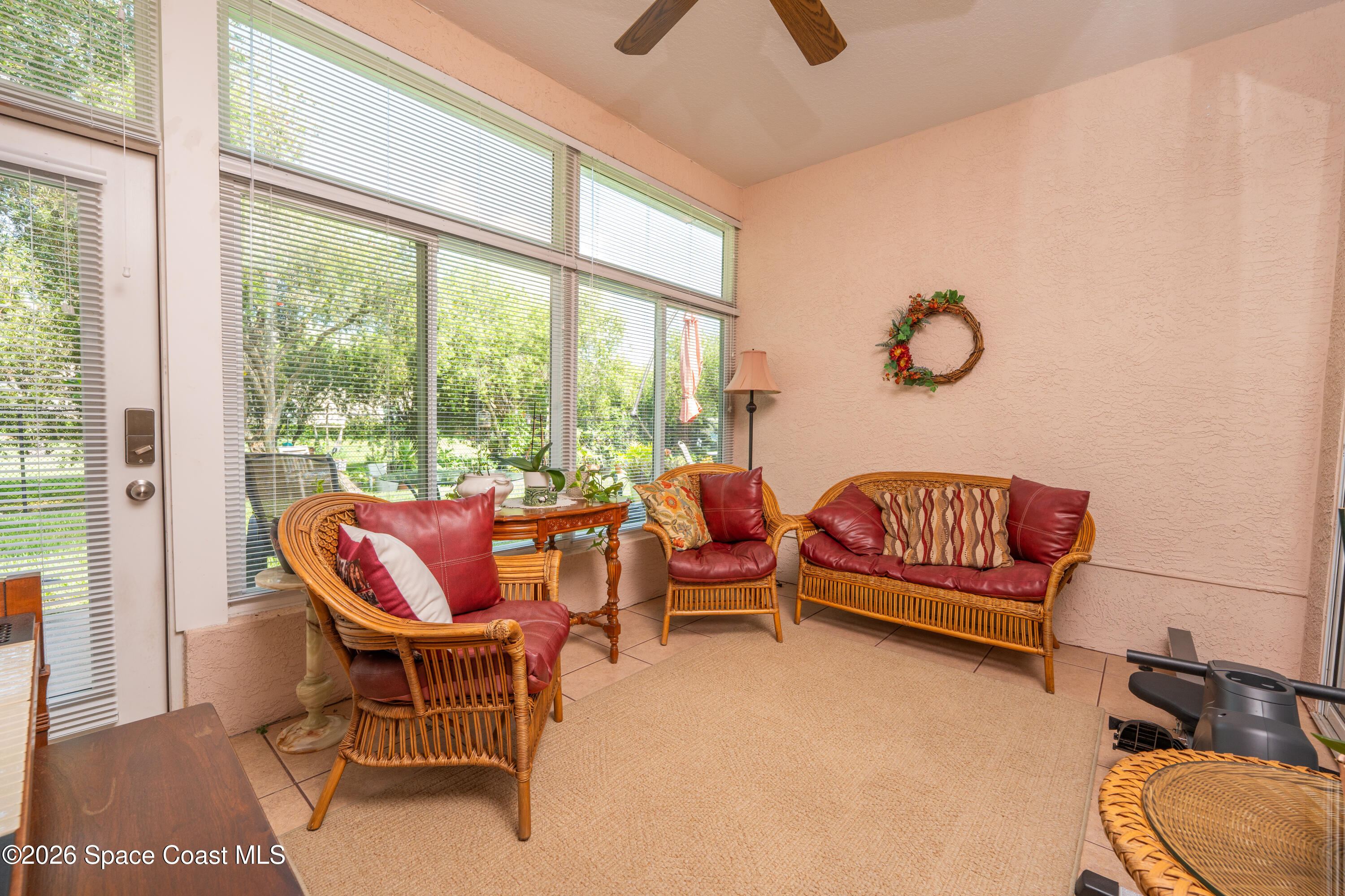 598 Renaissance Avenue Melbourne, FL 32940 - Photo 28 of 56 a outdoor living space with furniture and a window