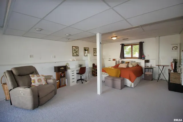 a bedroom with furniture and a couch