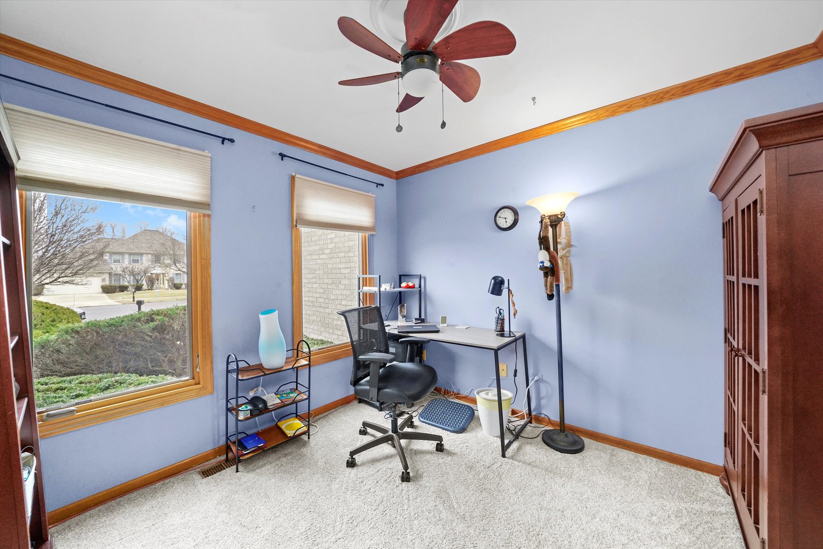 18 Newgate Avenue Naperville, IL 60565 - Photo 12 of 31 a view of a workspace with furniture and a window