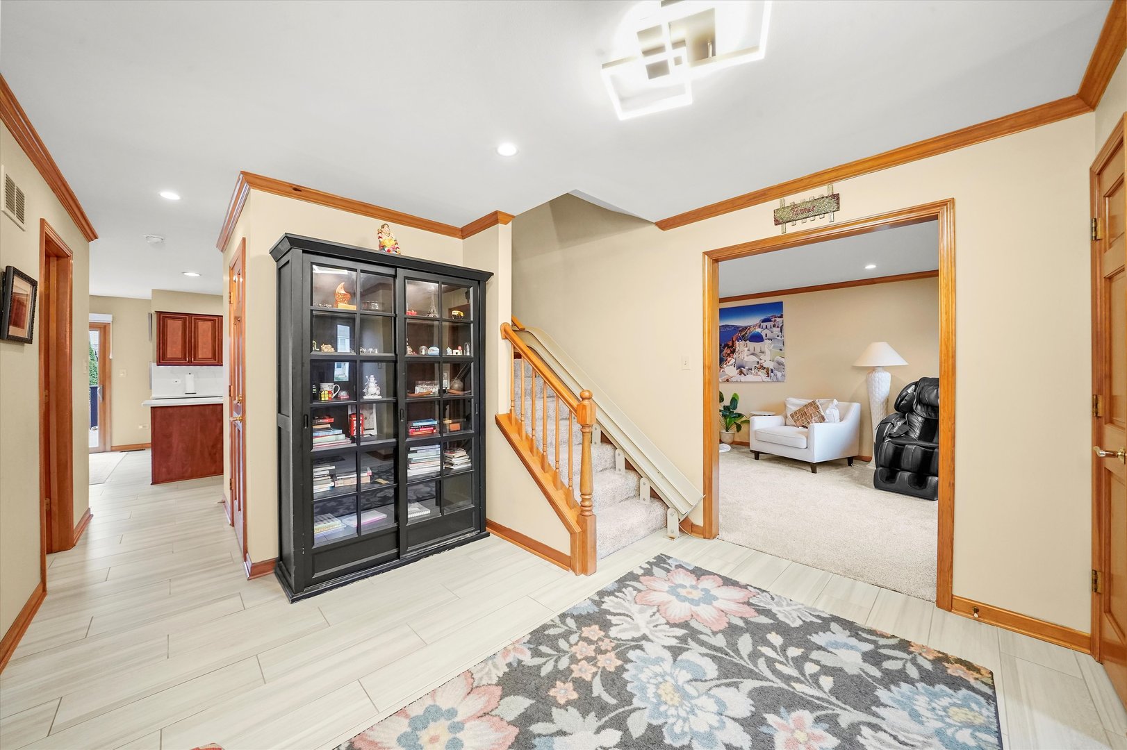 18 Newgate Avenue Naperville, IL 60565 - Photo 13 of 31 a view of a hallway with wooden floor and furniture