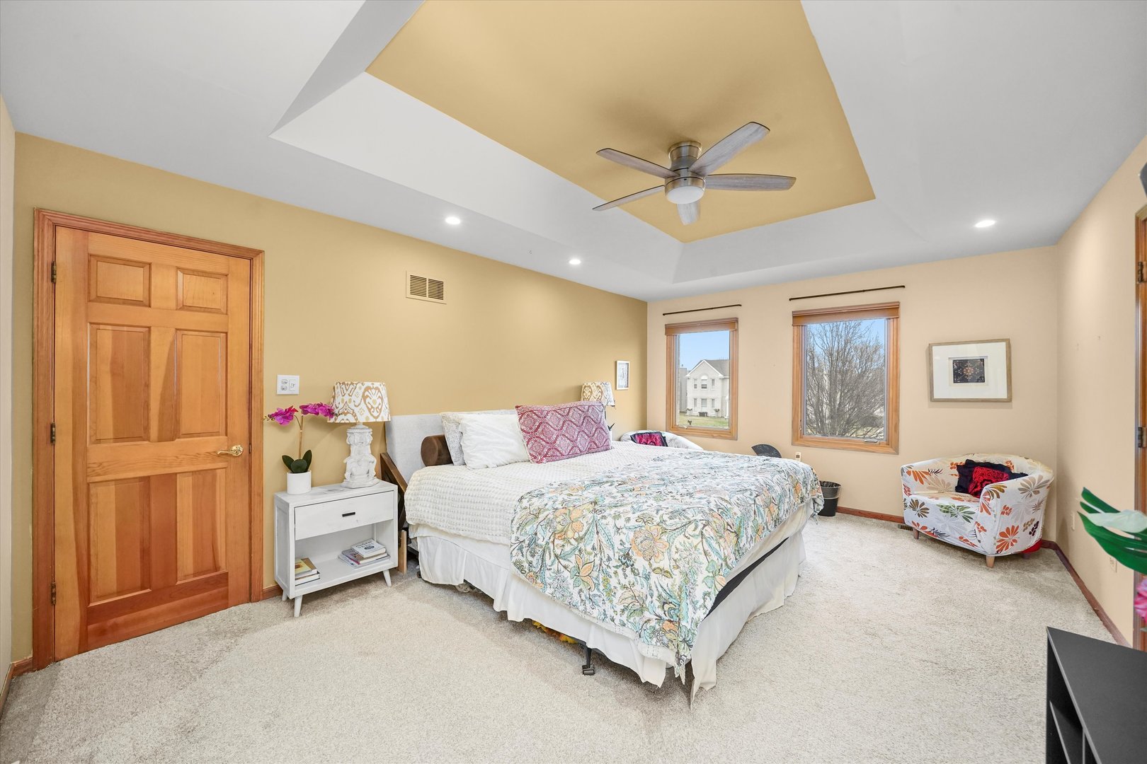 18 Newgate Avenue Naperville, IL 60565 - Photo 14 of 31 a bedroom with a bed and a chandelier