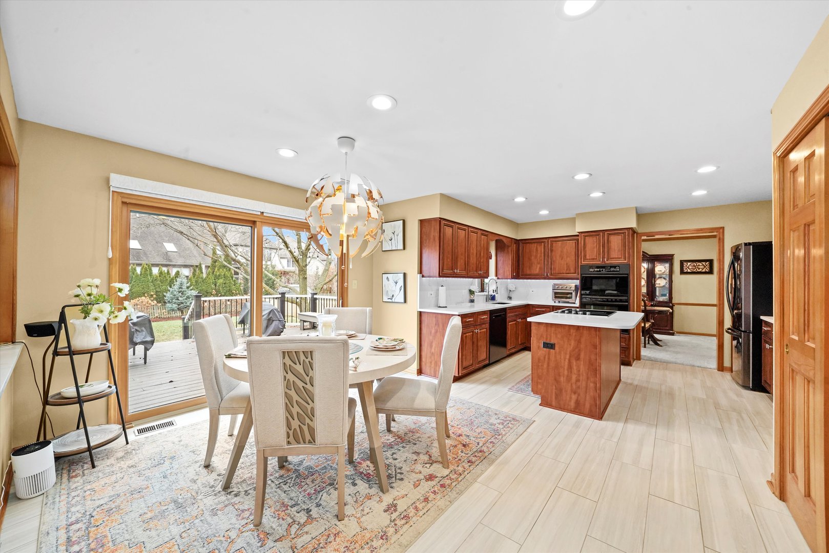 18 Newgate Avenue Naperville, IL 60565 - Photo 2 of 31 a view of a dining room with furniture window and outside view