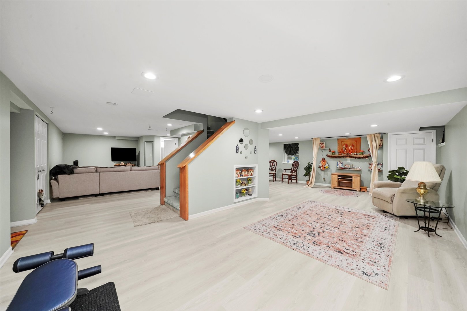 18 Newgate Avenue Naperville, IL 60565 - Photo 22 of 31 a living room with furniture and a flat screen tv