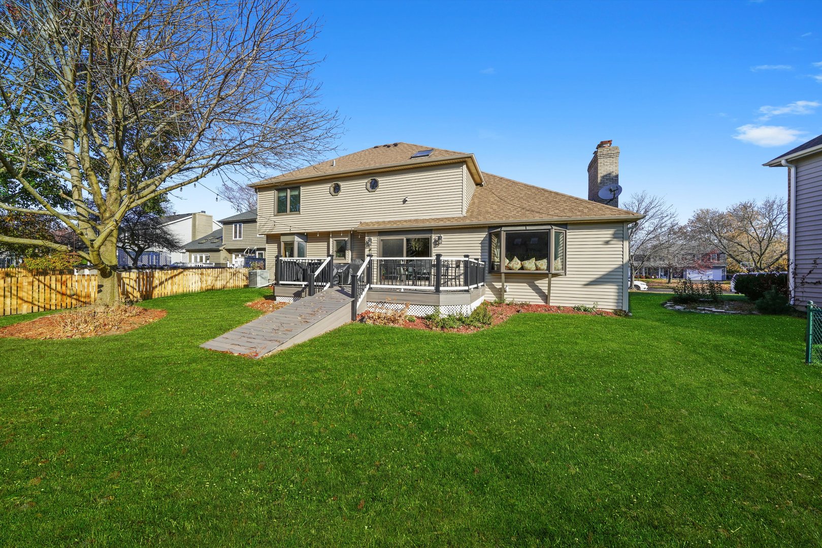 18 Newgate Avenue Naperville, IL 60565 - Photo 29 of 31 a front view of a house with garden