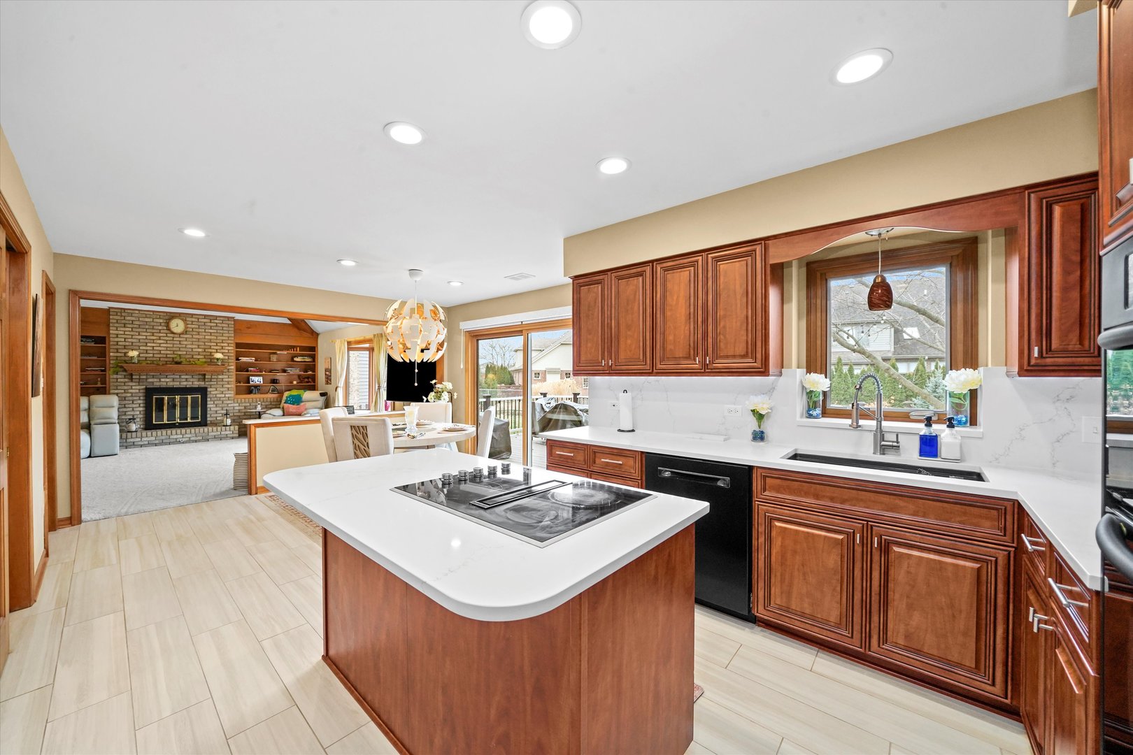 18 Newgate Avenue Naperville, IL 60565 - Photo 5 of 31 a kitchen with a sink stove and cabinets