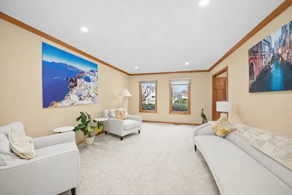 a living room with furniture and window