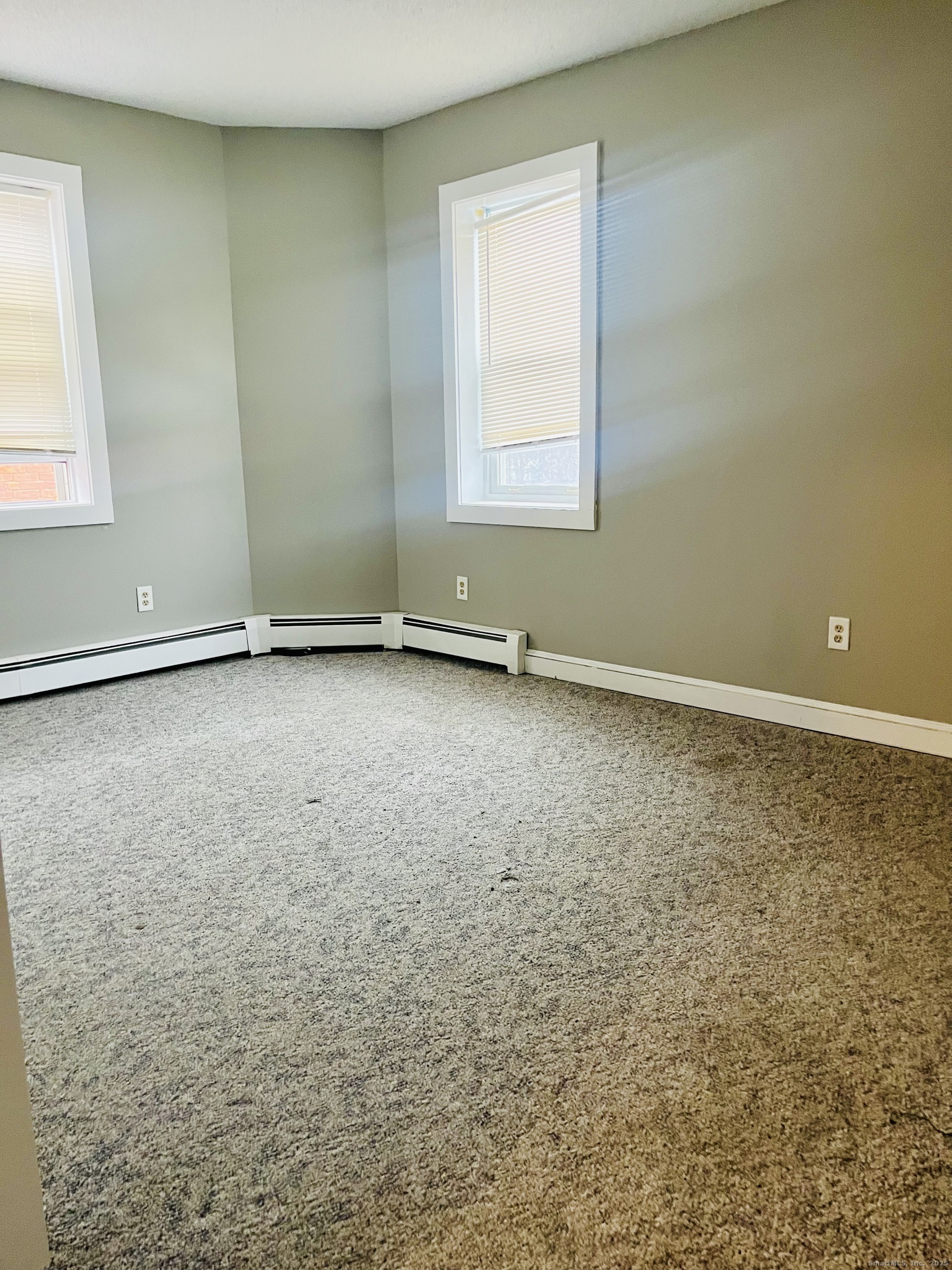 24 Mortson Street Hartford, CT 06106 - Photo 13 of 16 an empty room with a window