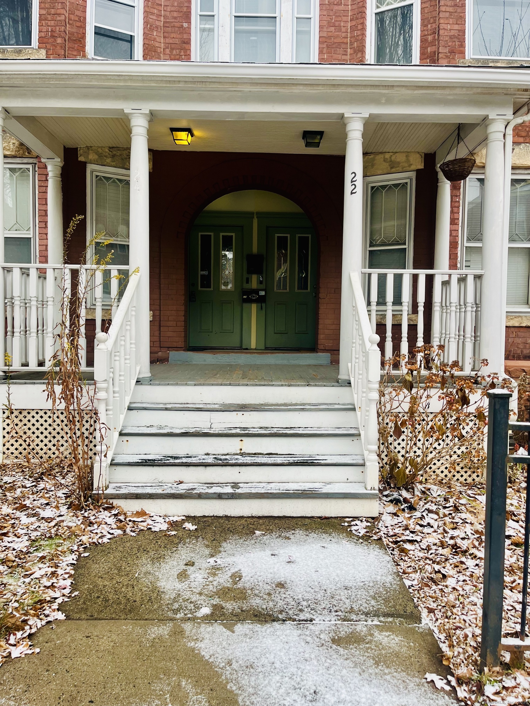 24 Mortson Street Hartford, CT 06106 - Photo 15 of 16 a front view of a house with a porch