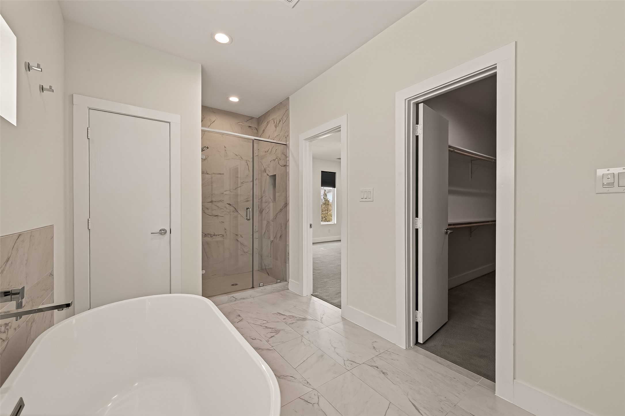 5505 Robusto Place Houston, TX 77091 - Photo 36 of 49 a bathroom with a bathtub and shower