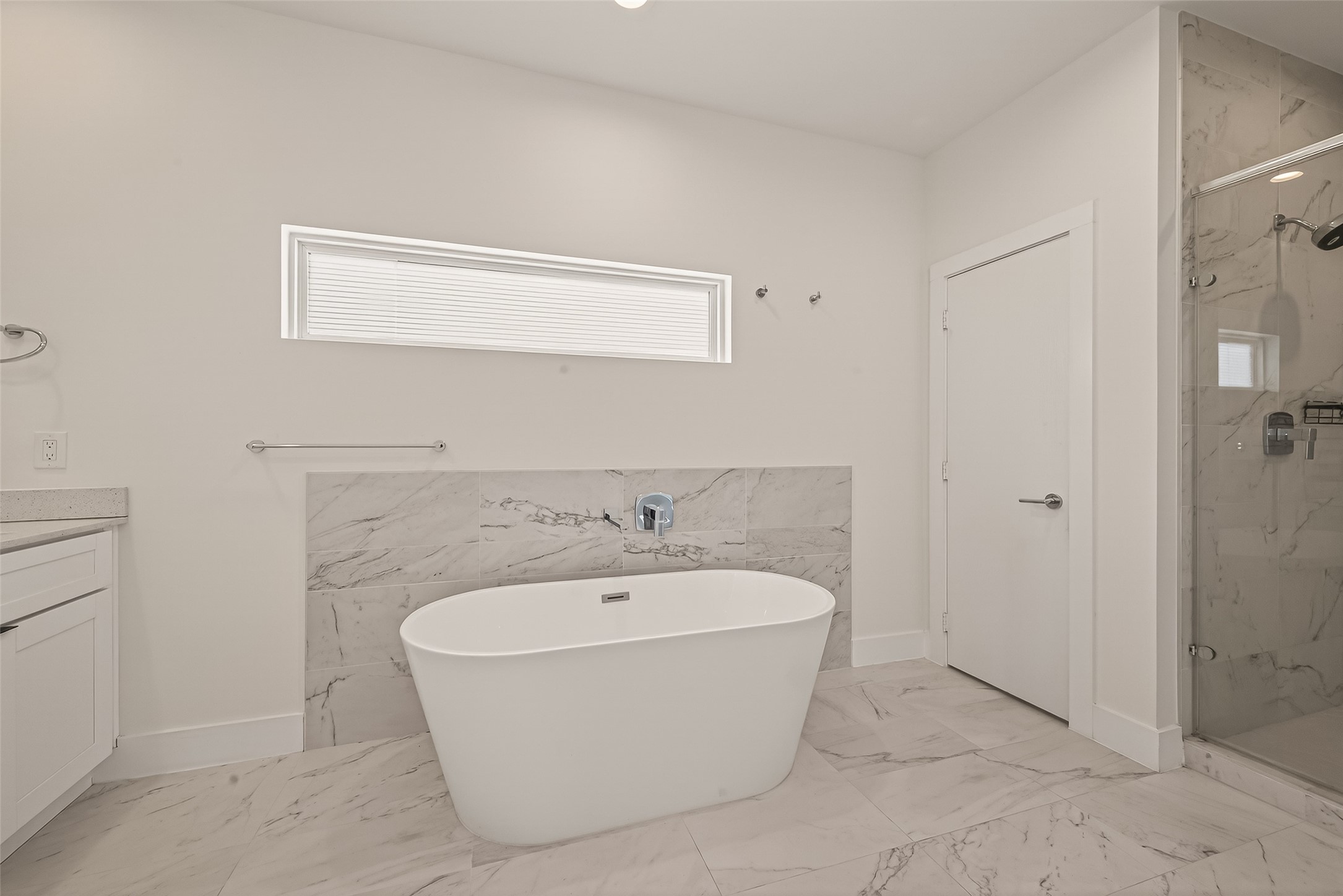 5505 Robusto Place Houston, TX 77091 - Photo 37 of 49 a white bath tub sitting in a bathroom