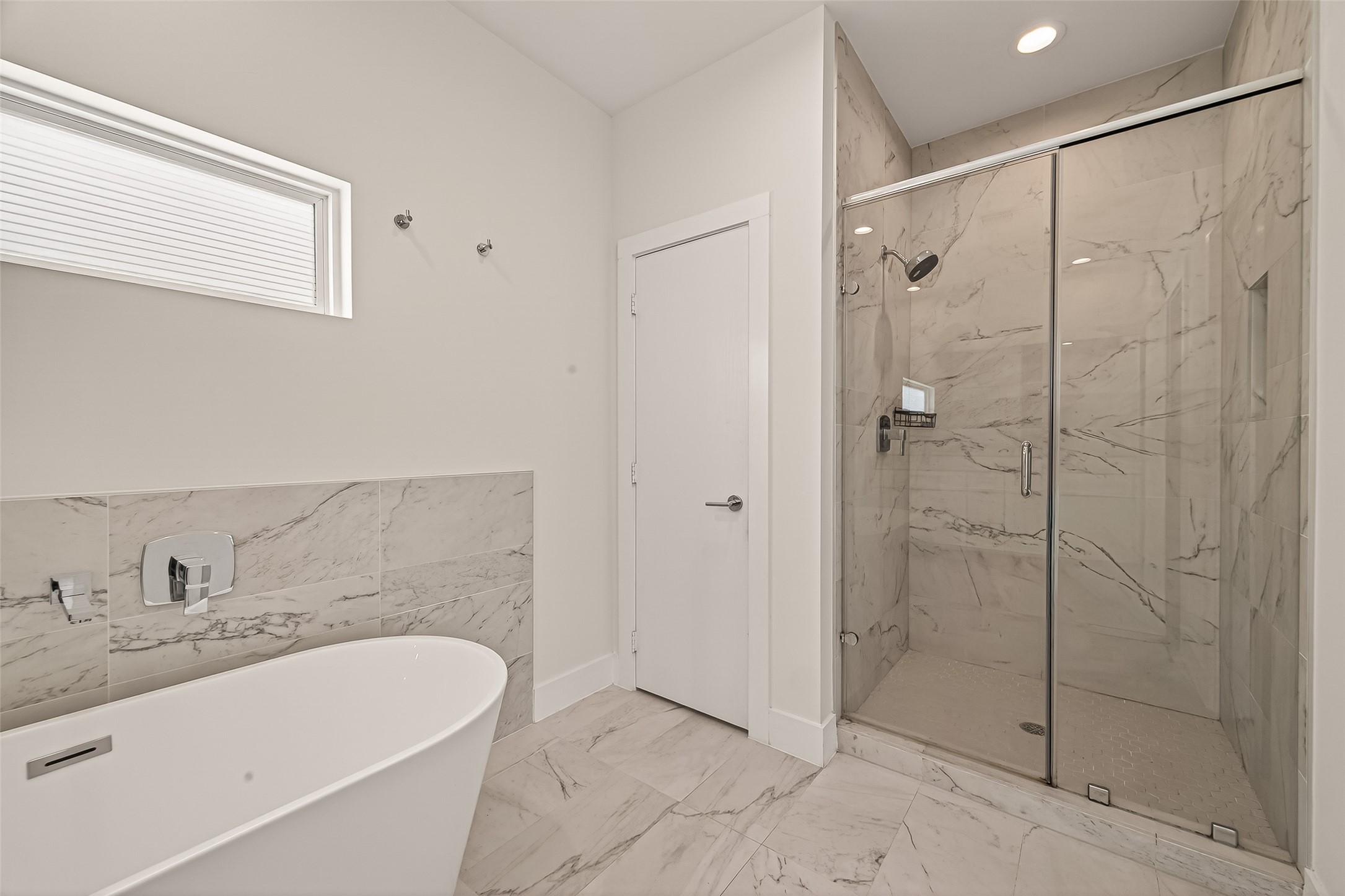 5505 Robusto Place Houston, TX 77091 - Photo 38 of 49 a bathroom with a shower and a sink