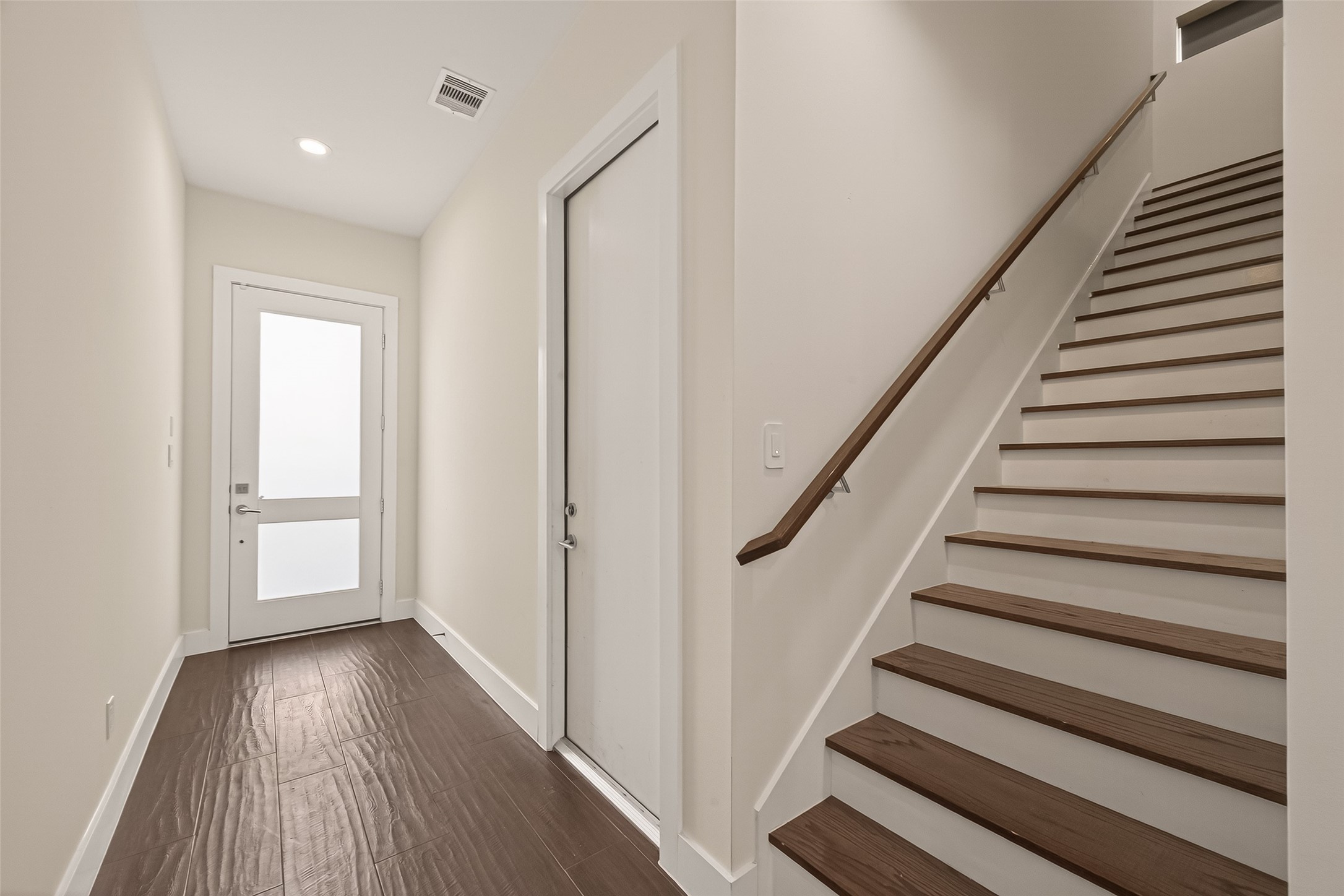 5505 Robusto Place Houston, TX 77091 - Photo 5 of 49 a view of entryway with wooden floor