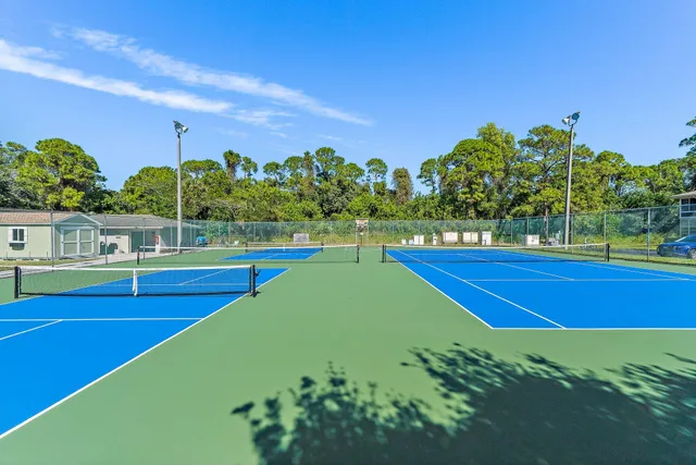 a view of swimming pool with sitting area