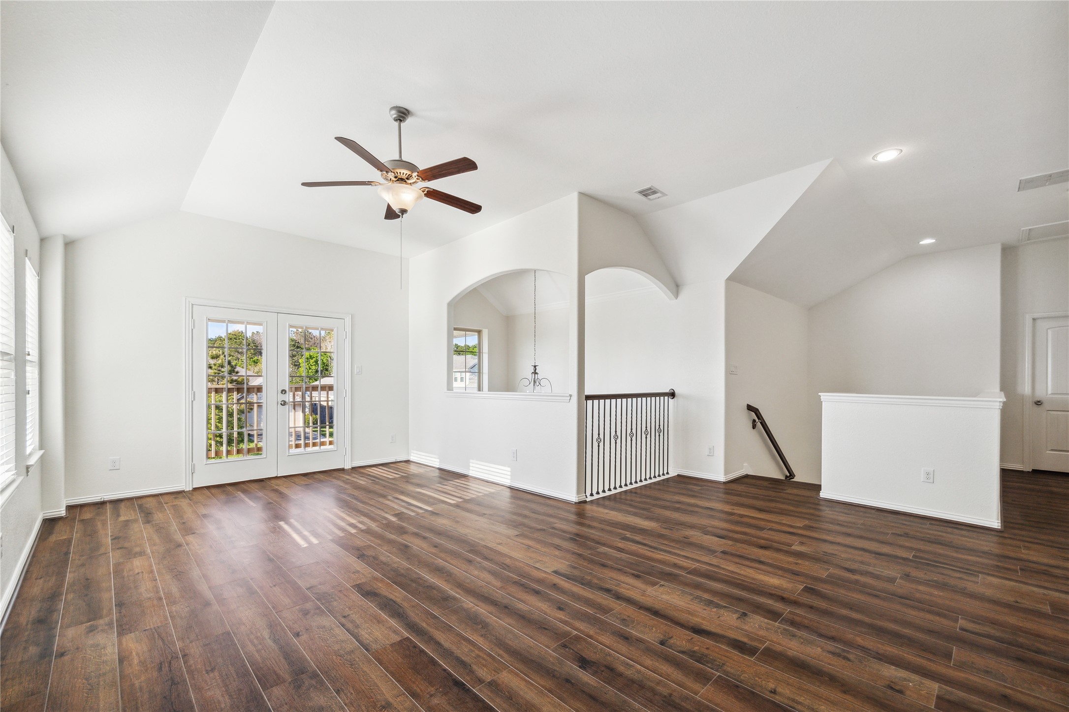 13108 Summit Harvest Lane Rosharon, TX 77583 - Photo 5 of 11 a view of empty room with wooden floor and fan
